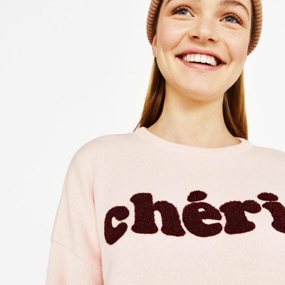 Sweater with slogan